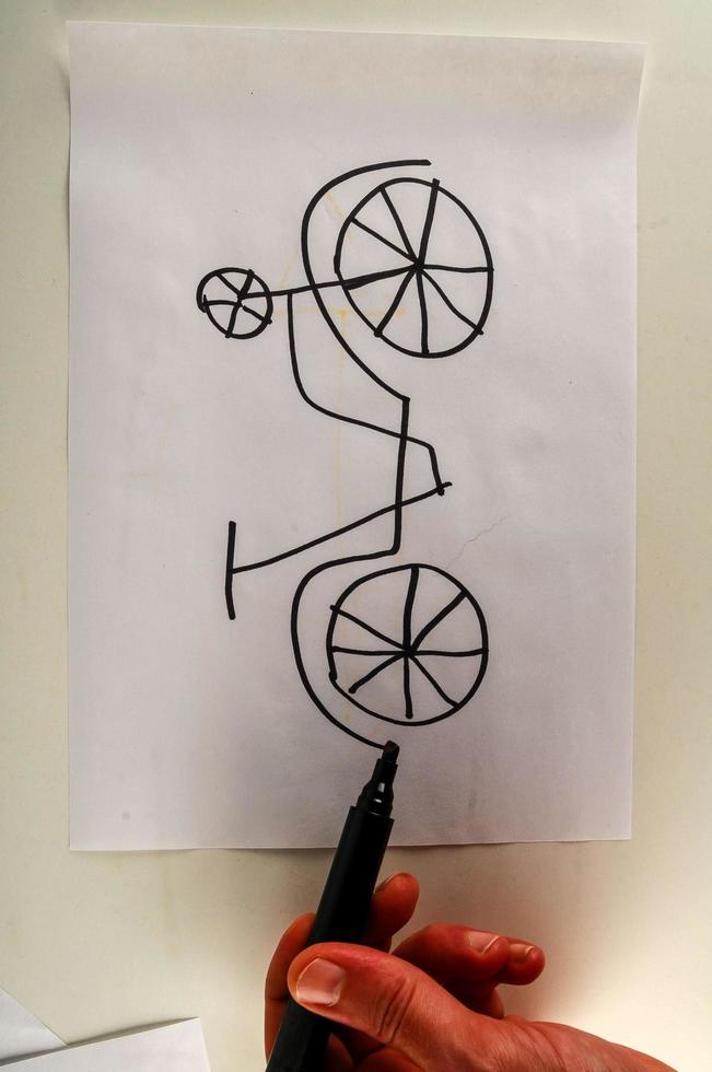 Hand drawing a bicycle photo