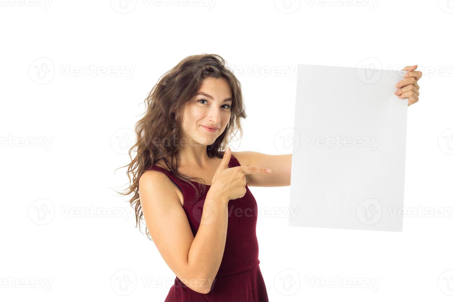 girl in red dress with white placard photo