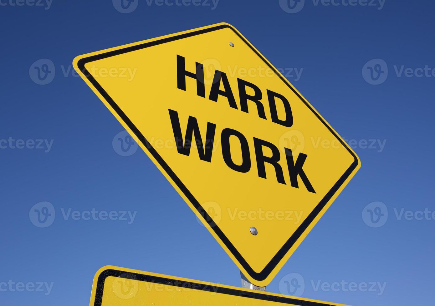 Yellow Hard Work Road Sign photo