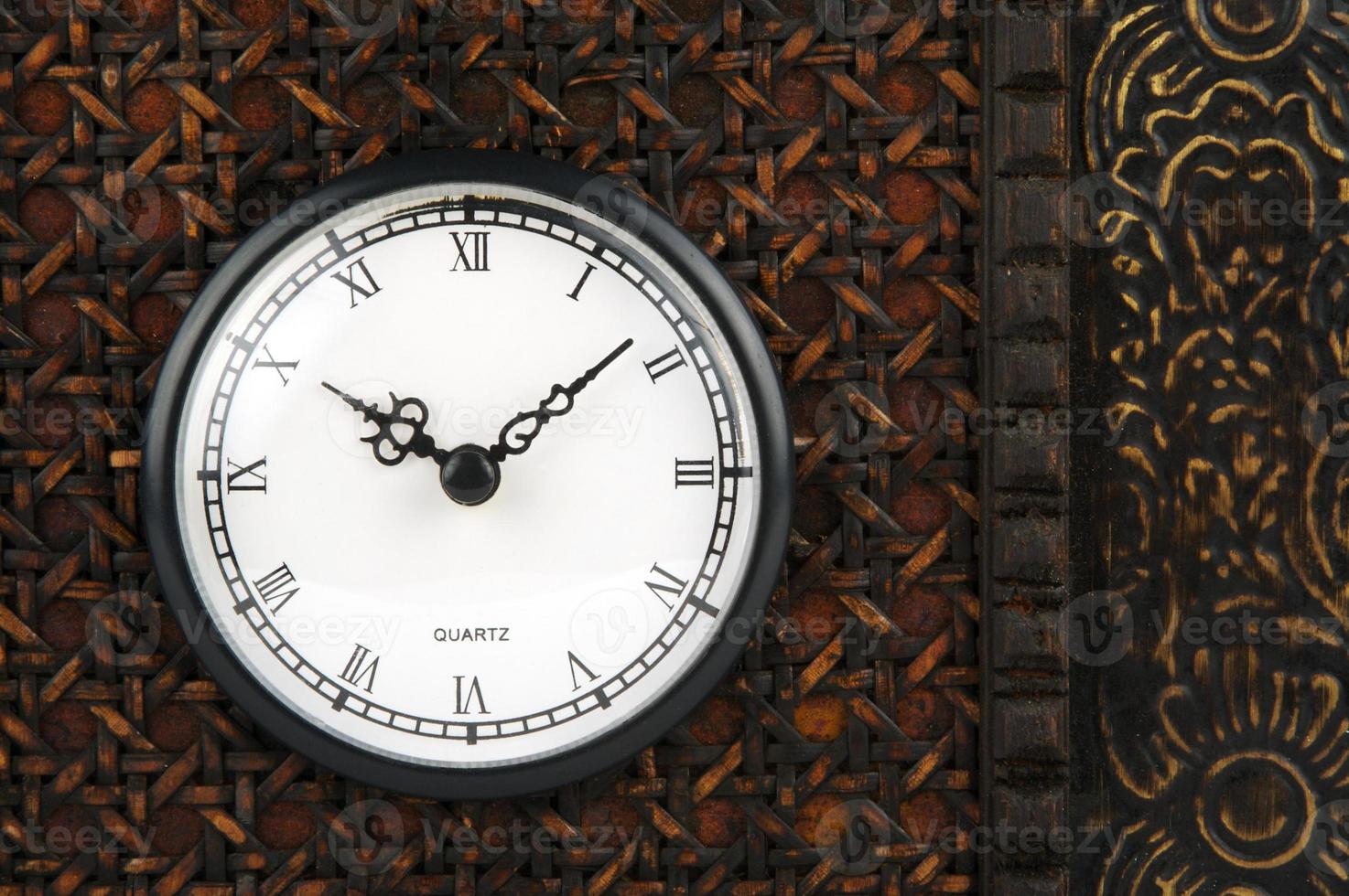 Close-up Front of Ornate Carriage Clock Box. photo