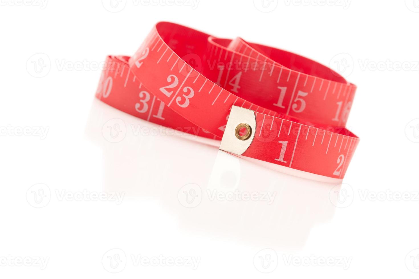 Red Measuring Tape on White photo