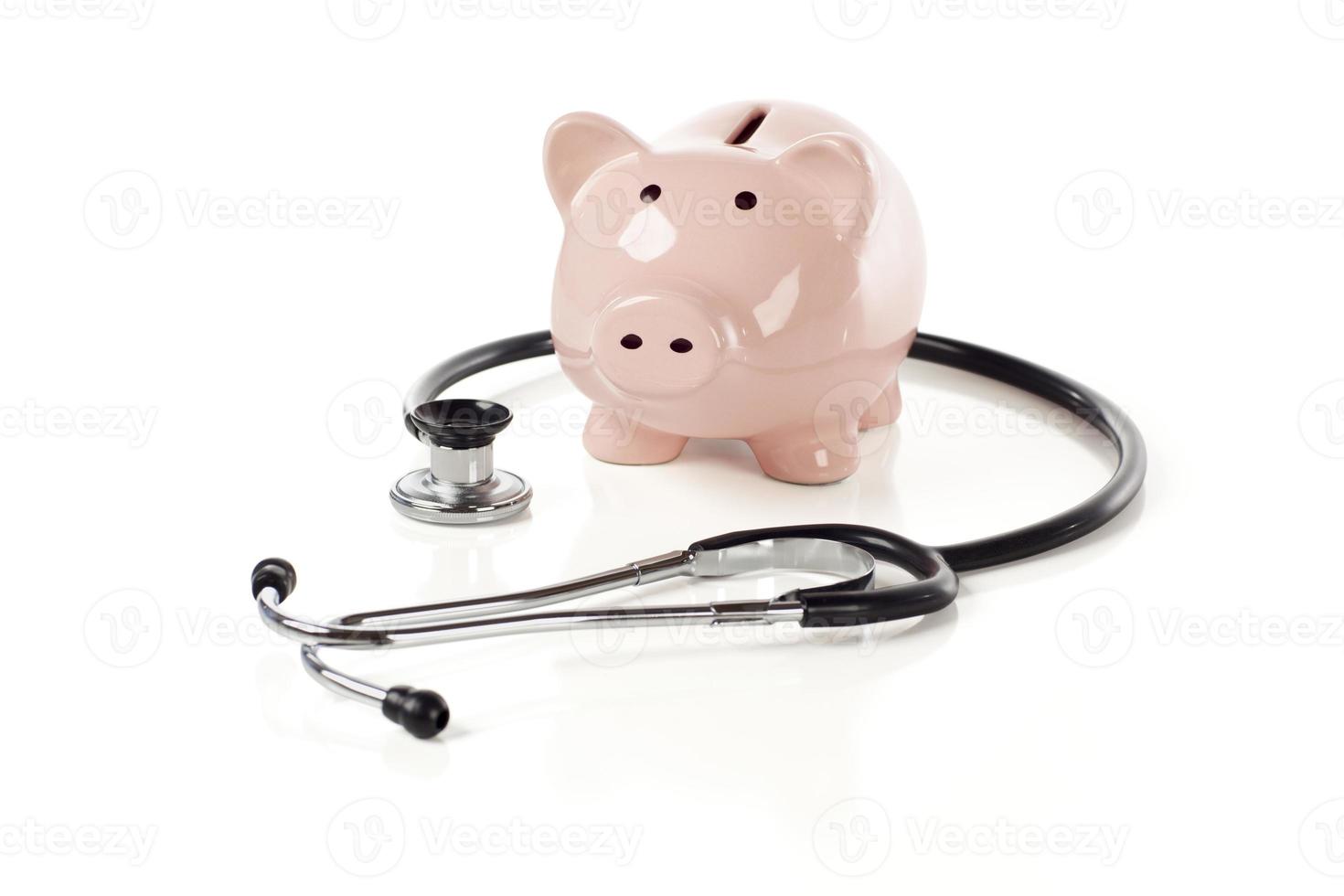 Piggy Bank and Stethoscope Isolated photo