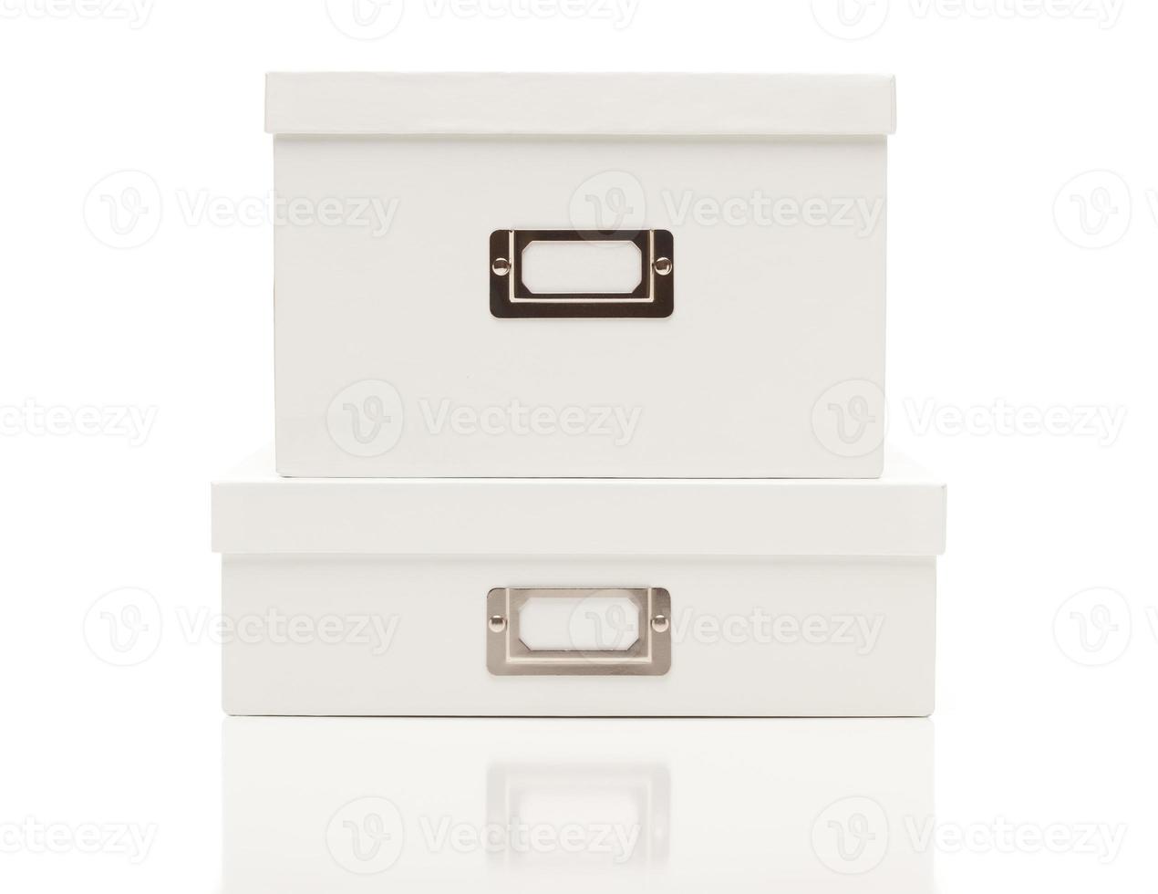 Stacked Blank White File Boxes with Lids on White photo
