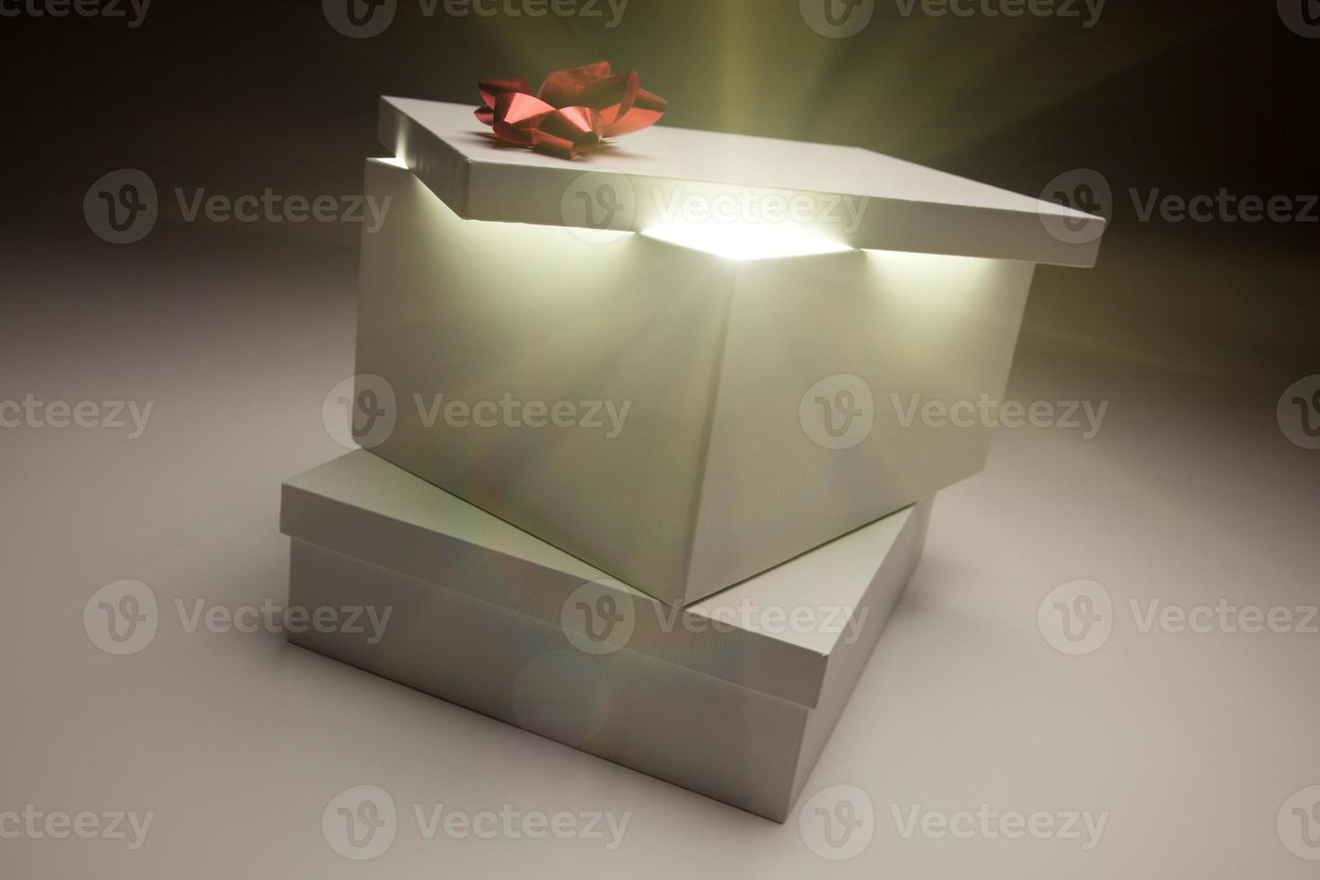 Red Bow Gift Box Lid Showing Very Bright Contents photo