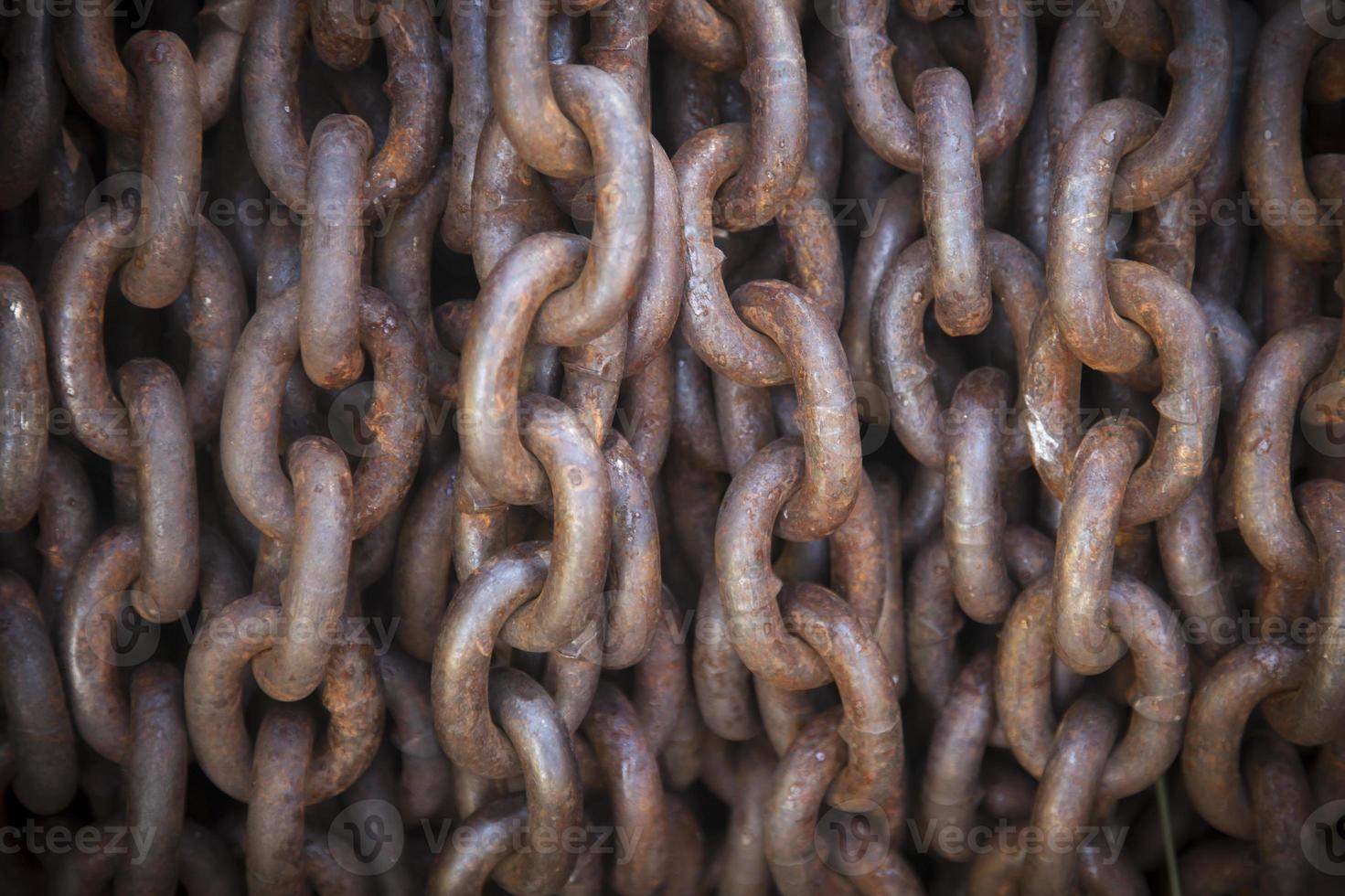 Thick Rusty Chain Background with Vignette photo