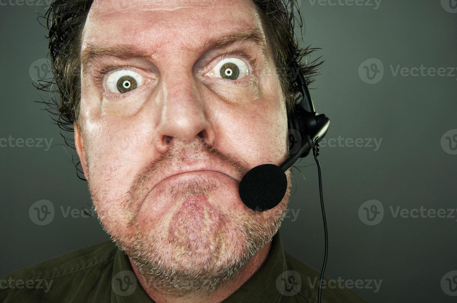 Grumpy Customer Support Man with Headset photo