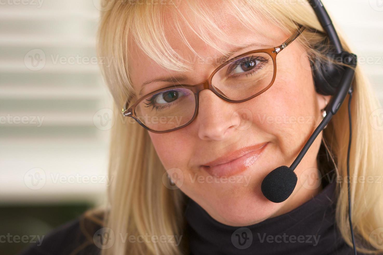 Attractive Businesswoman with Phone Headset photo