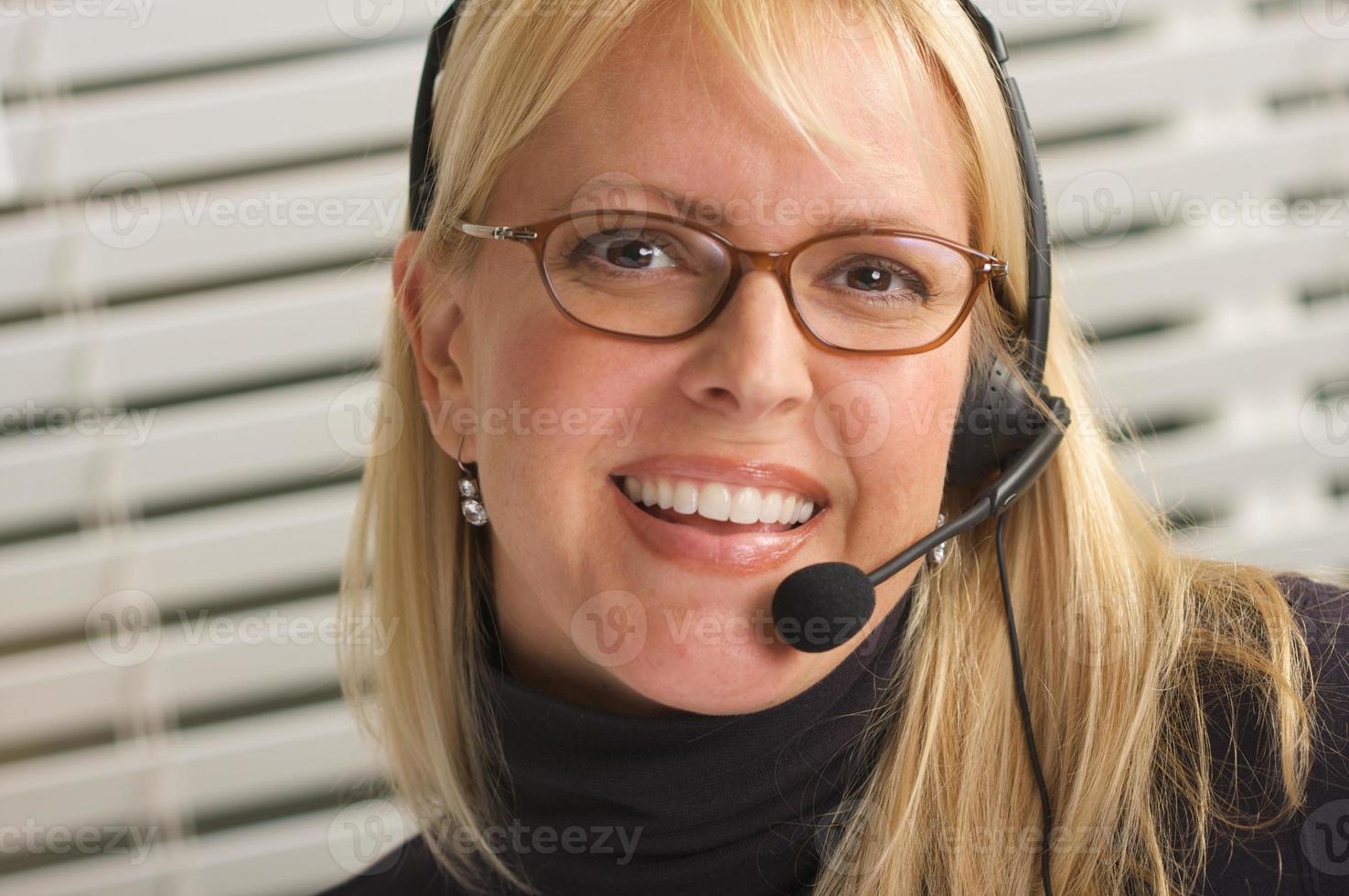 Attractive Businesswoman with Phone Headset photo
