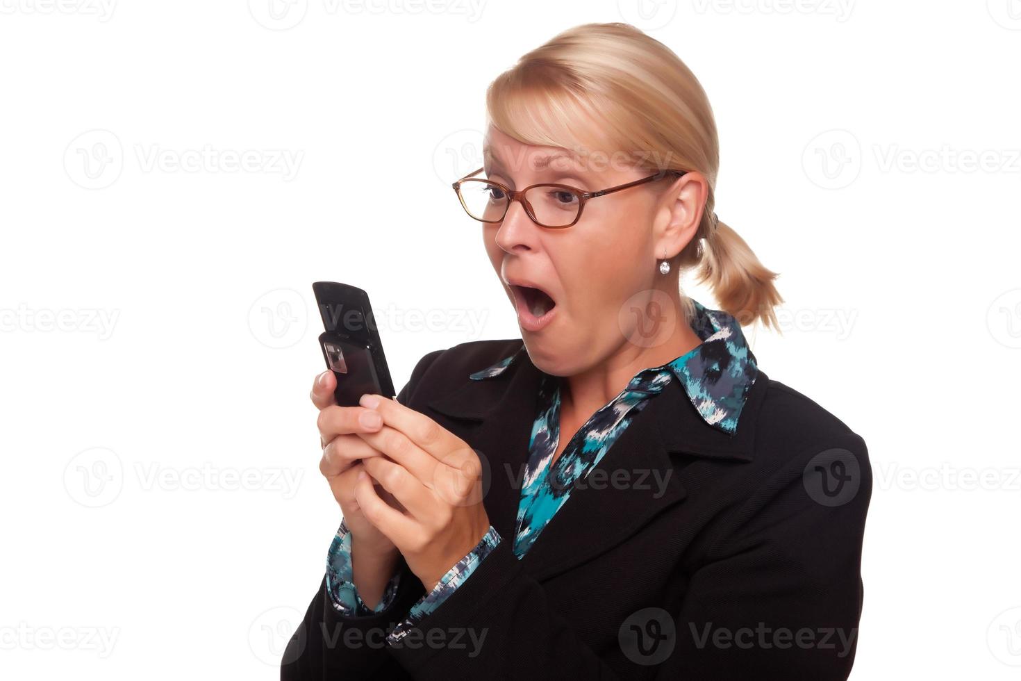 Shocked Blonde Woman Using Cell Phone photo