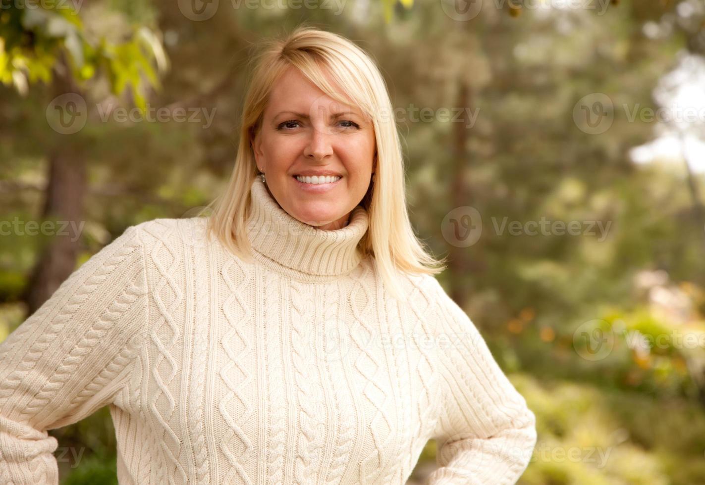 Attractive Blonde Woman in the Park photo