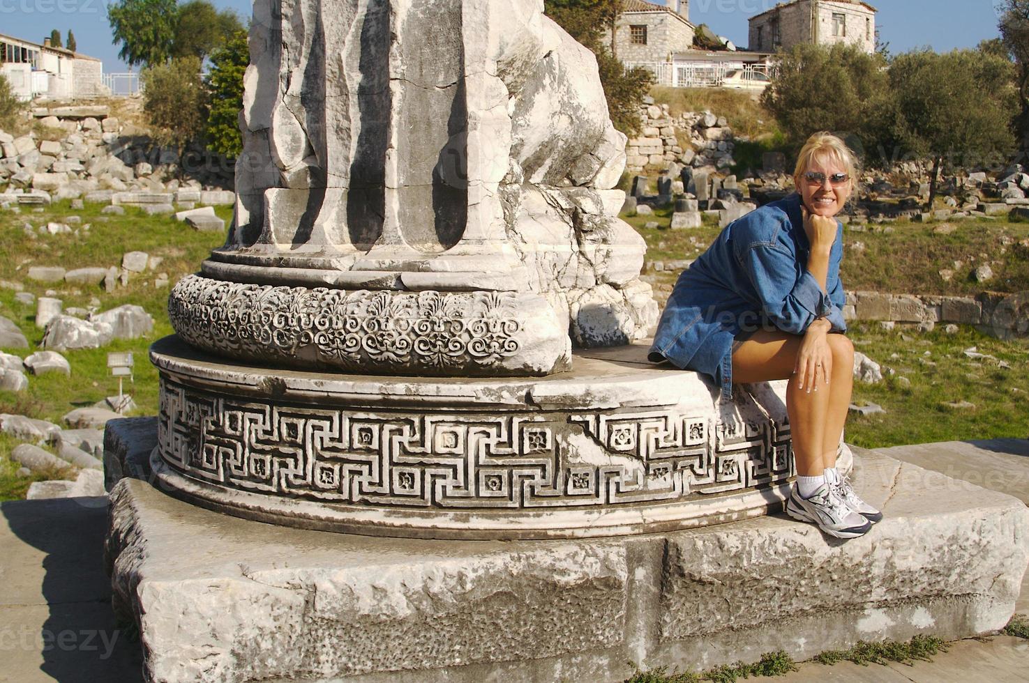 Attractive Tourist Rests on Ruins photo
