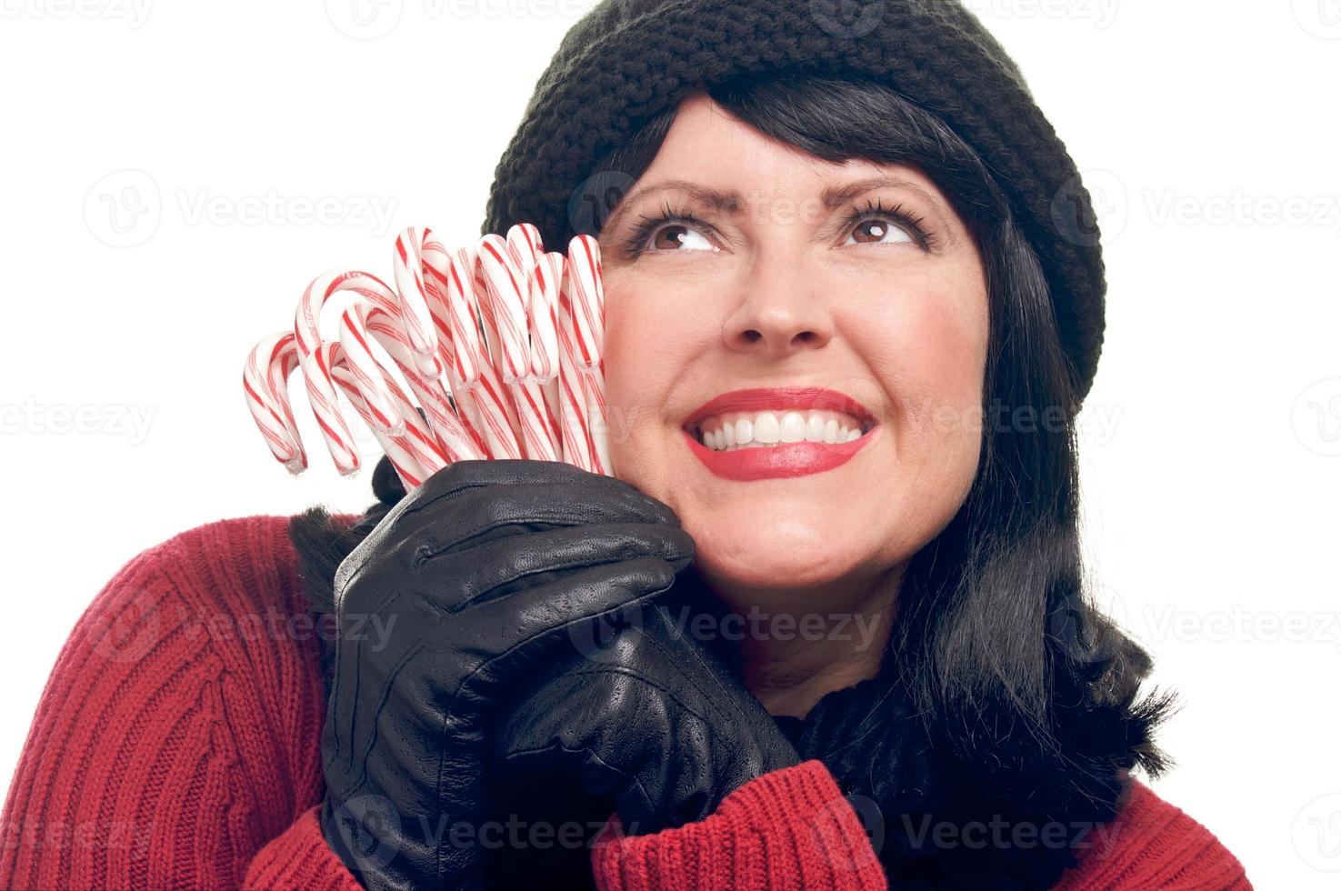 Attractive Woman Holds Candy Canes photo