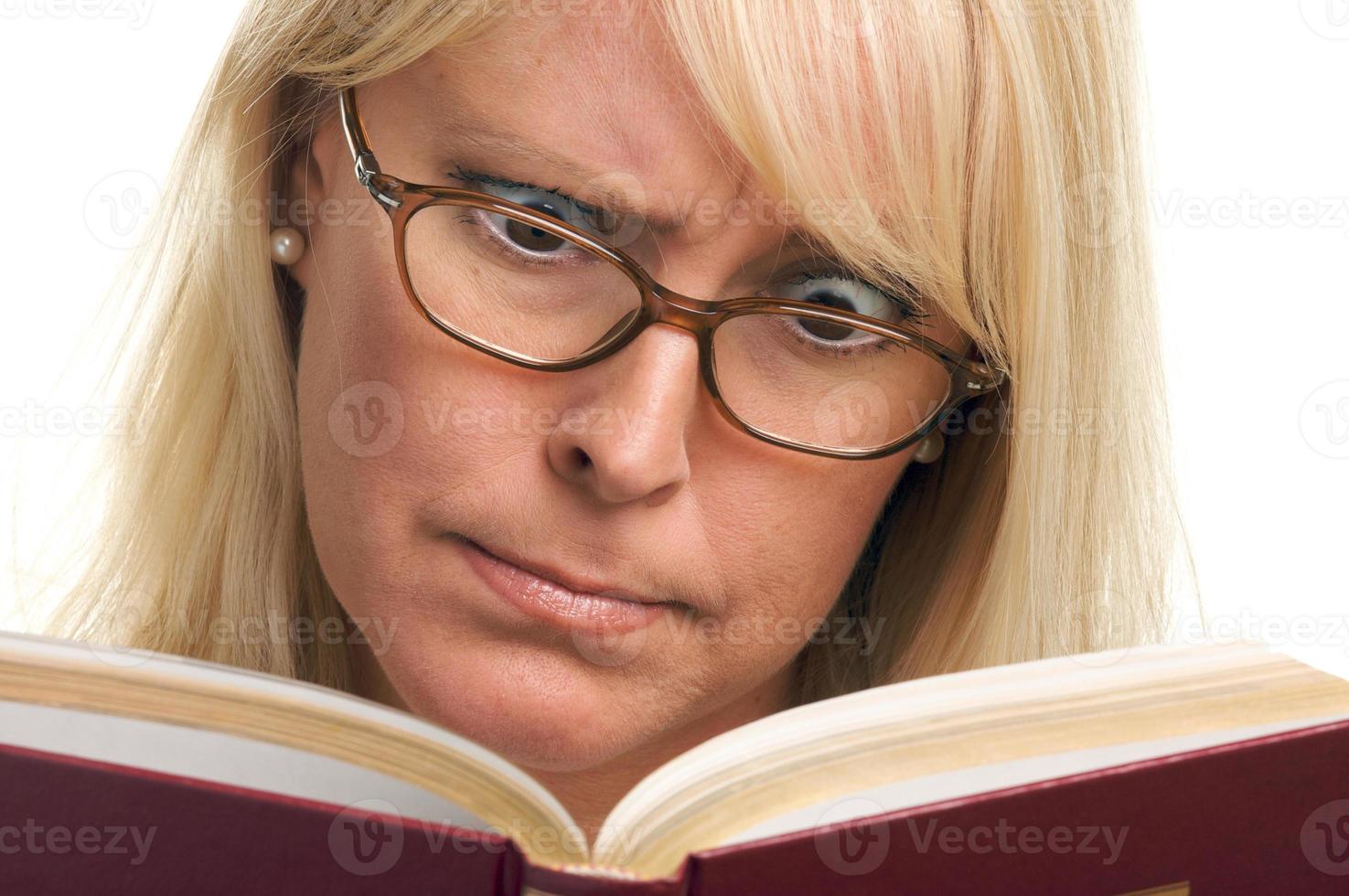 Attractive Woman Taken Back While Reading photo