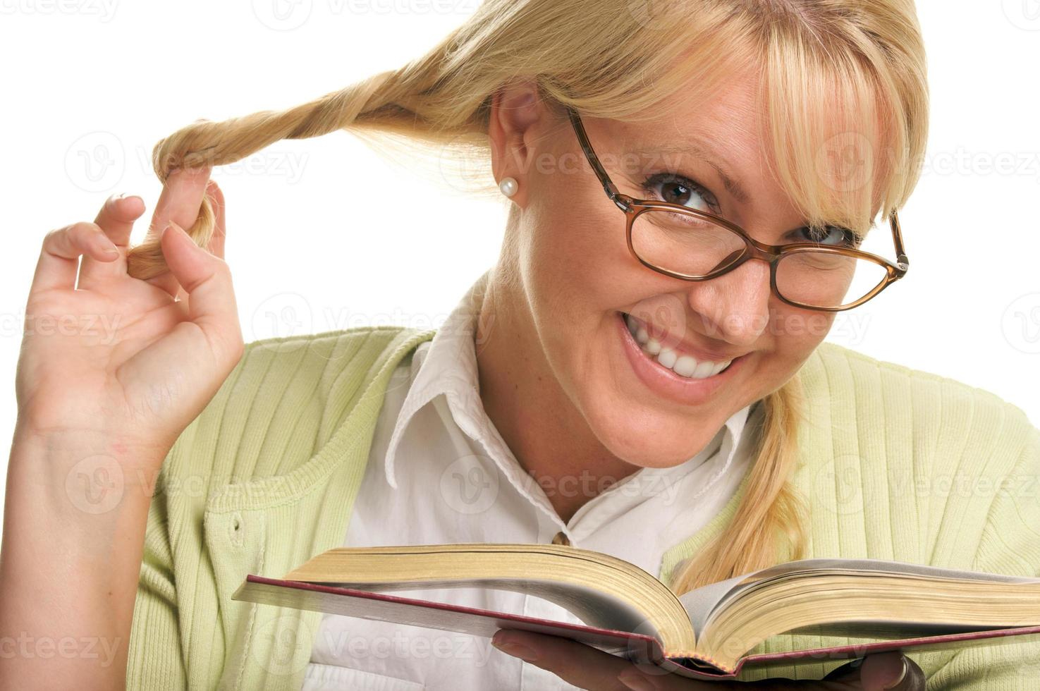 Female With Ponytails Reads Her Book photo