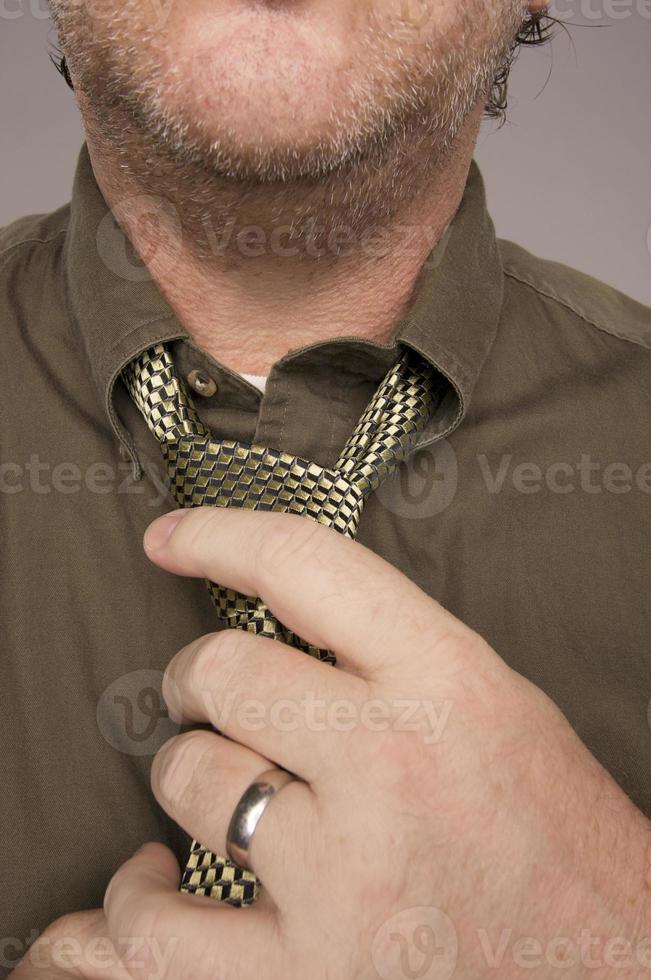 Man Fixing Tie photo