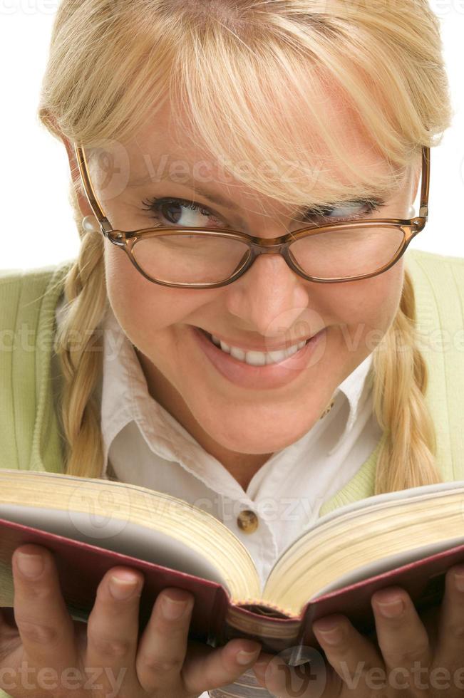 Female With Ponytails Reads Her Book photo