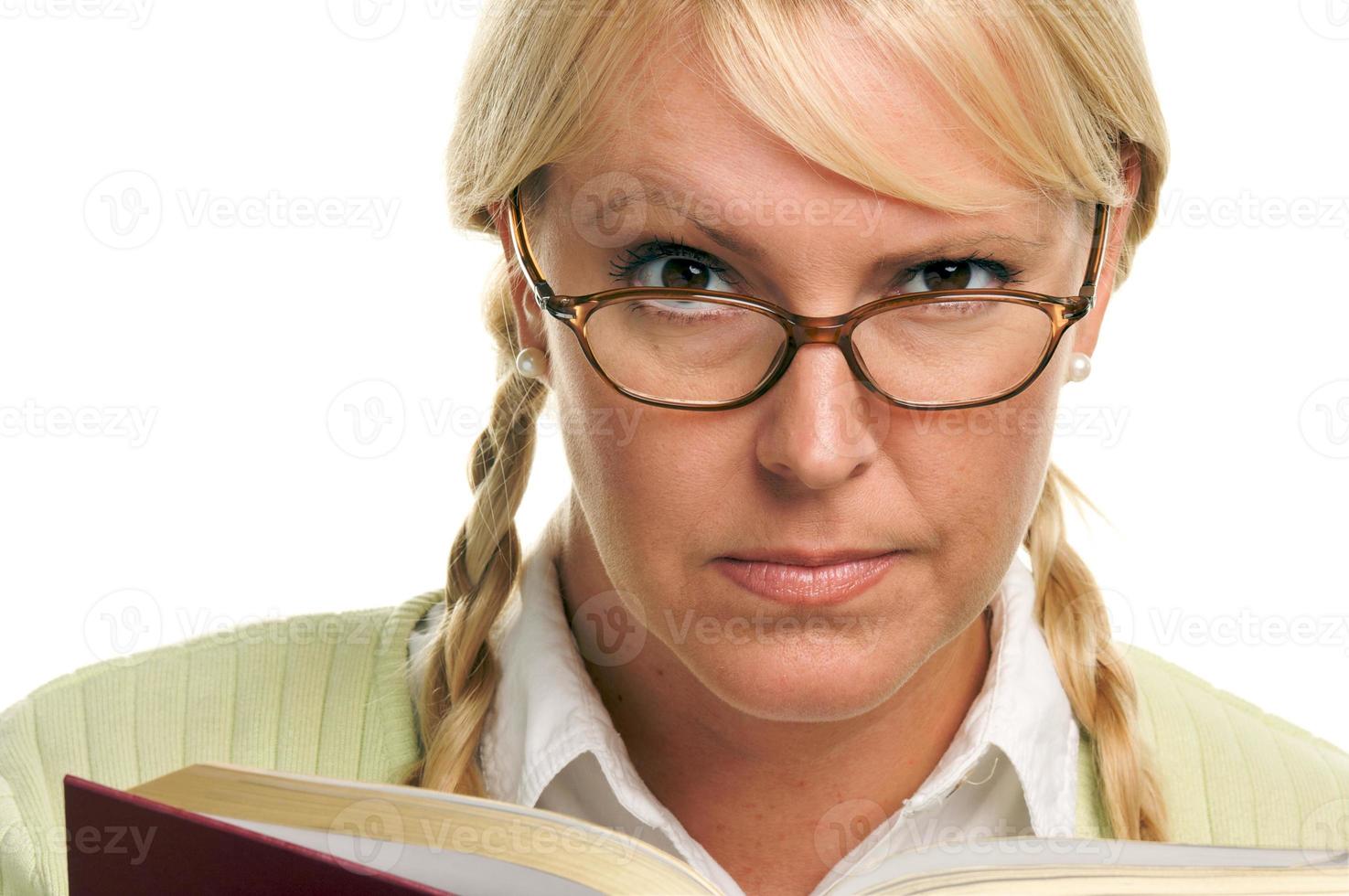 Serious Female with Ponytails and Book photo