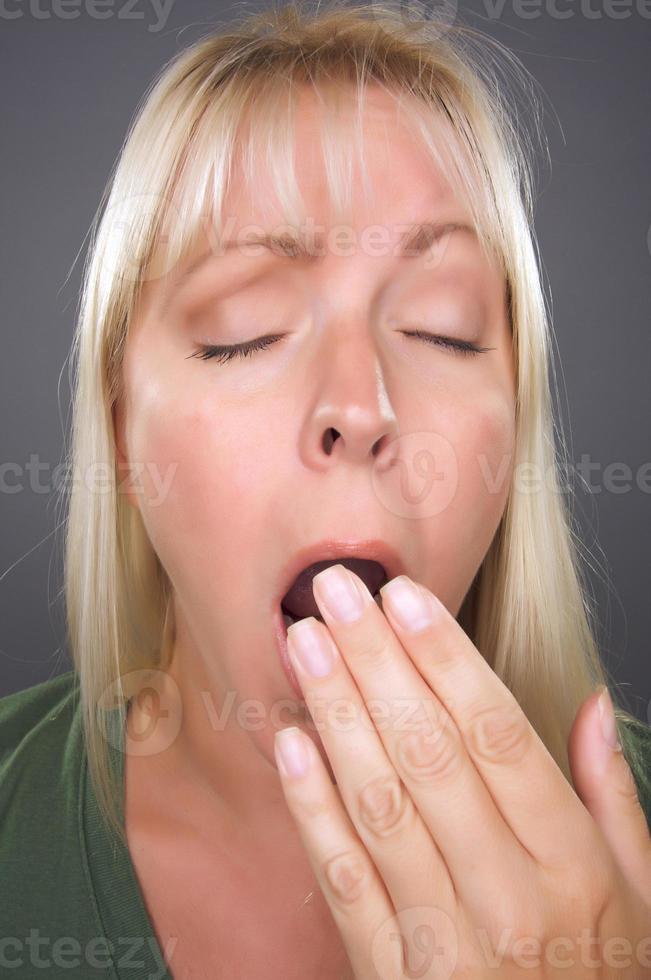 Yawning Blond Woman photo