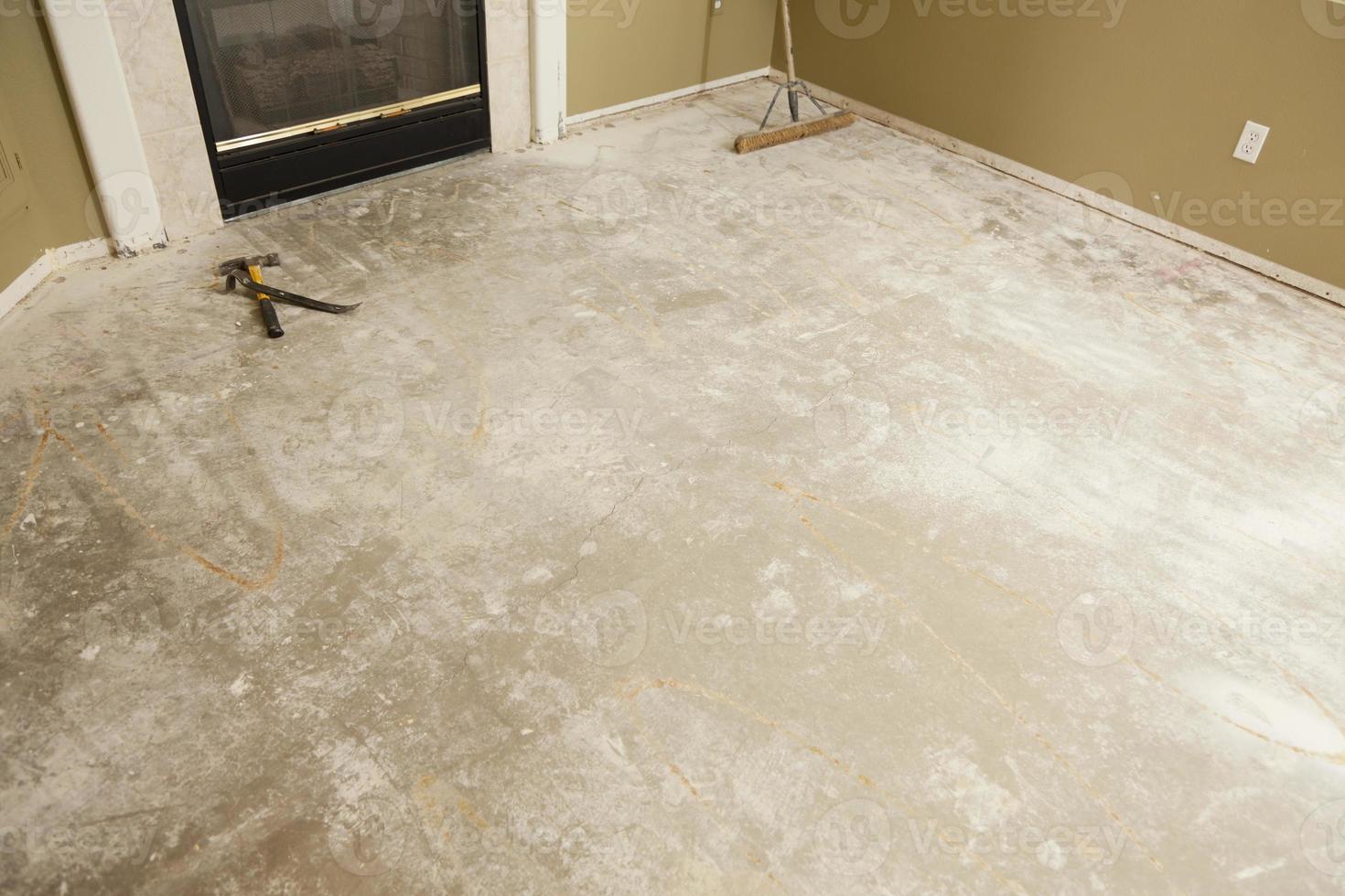 Concrete House Floor with Broom Ready for Flooring Installation photo