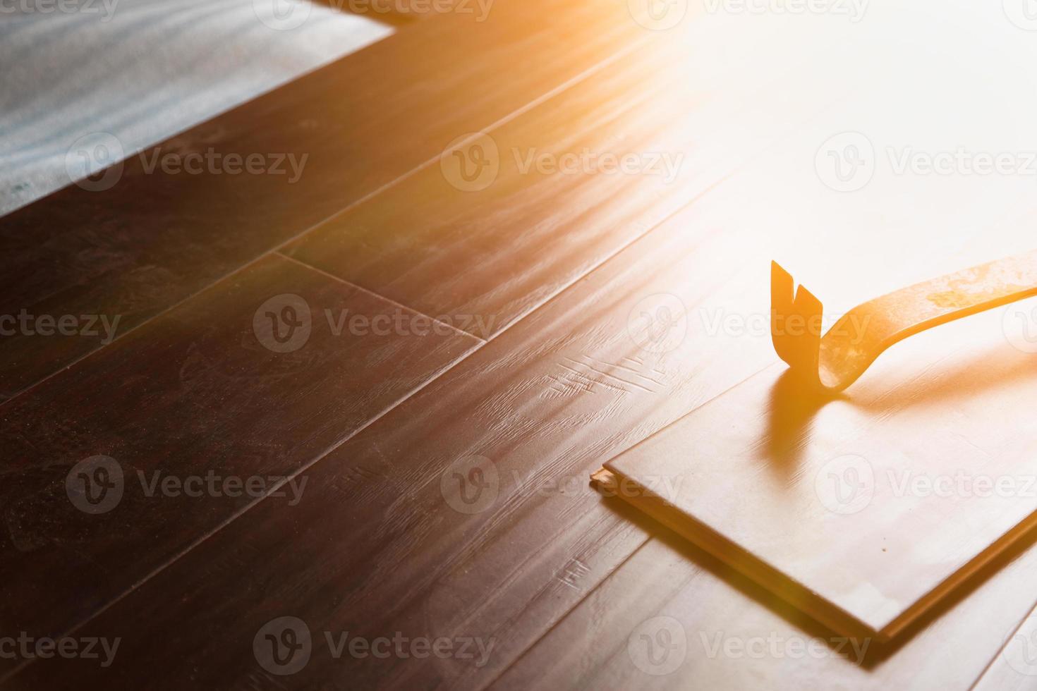 Pry Bar Tool with New Laminate Flooring photo