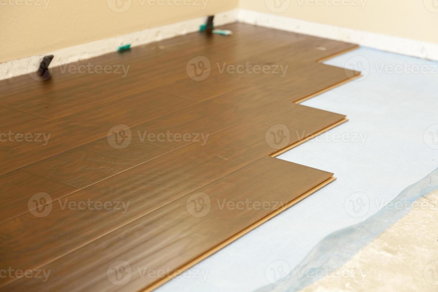 Newly Installed Brown Laminate Flooring photo