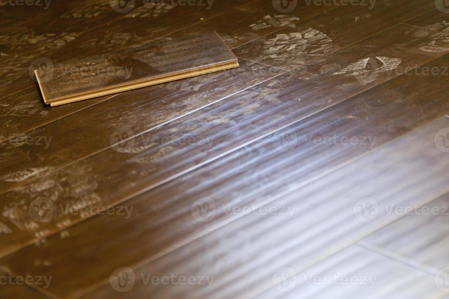 Newly Installed Dusty Brown Laminate Flooring photo