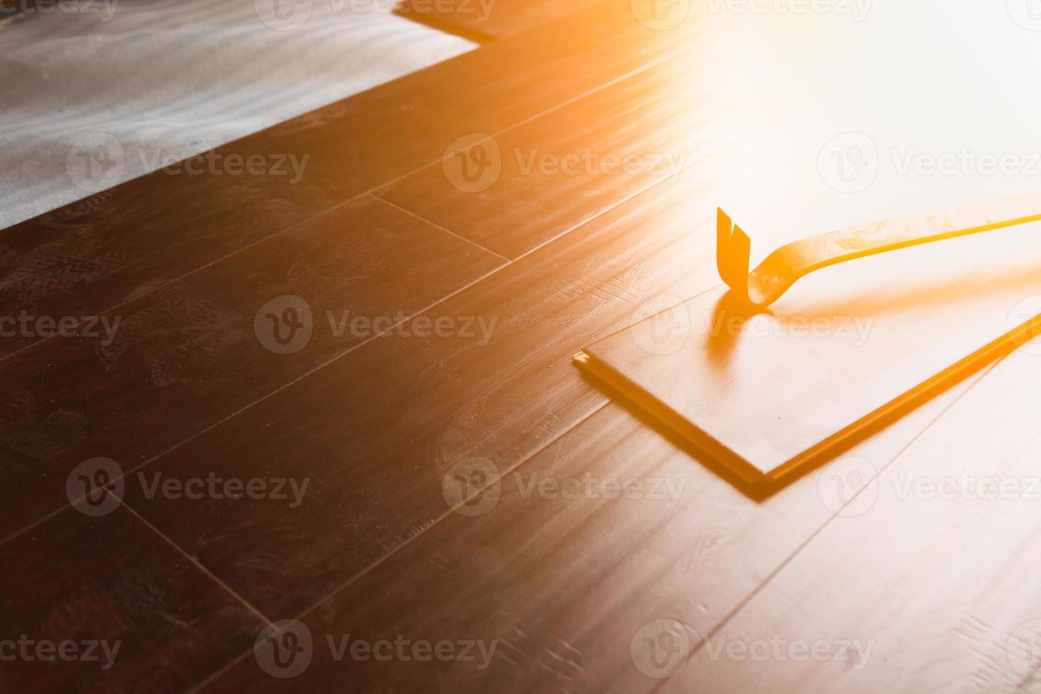 Pry Bar Tool with New Laminate Flooring photo