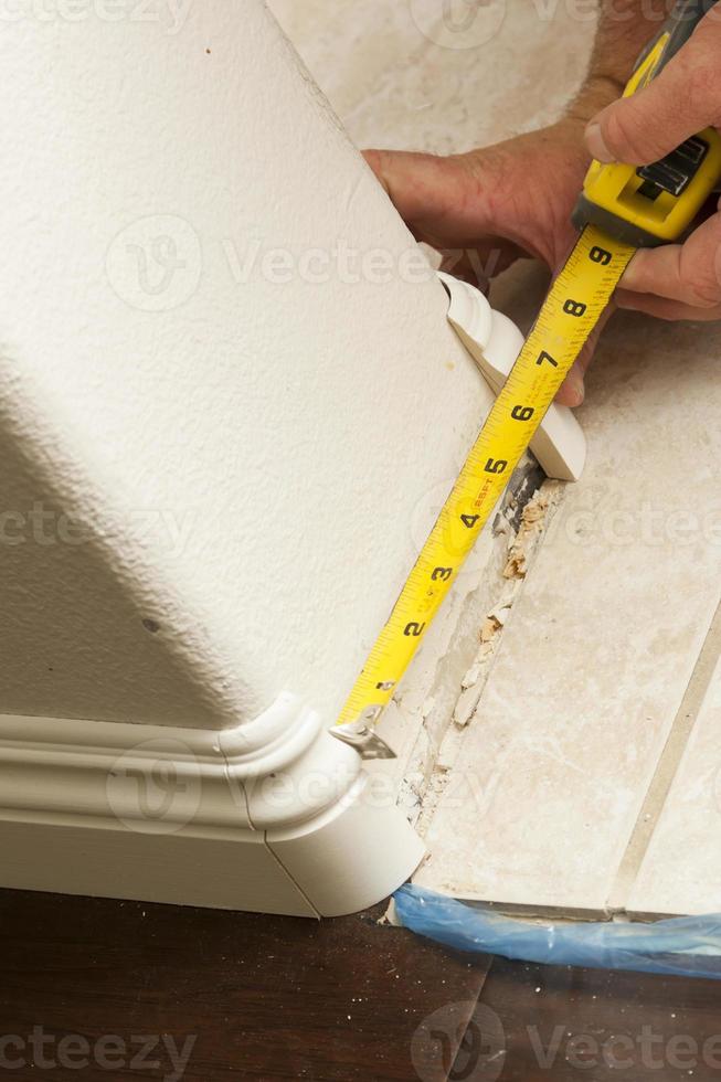 Measuring for New Baseboard with Bull Nose Corners and New Laminate Flooring photo