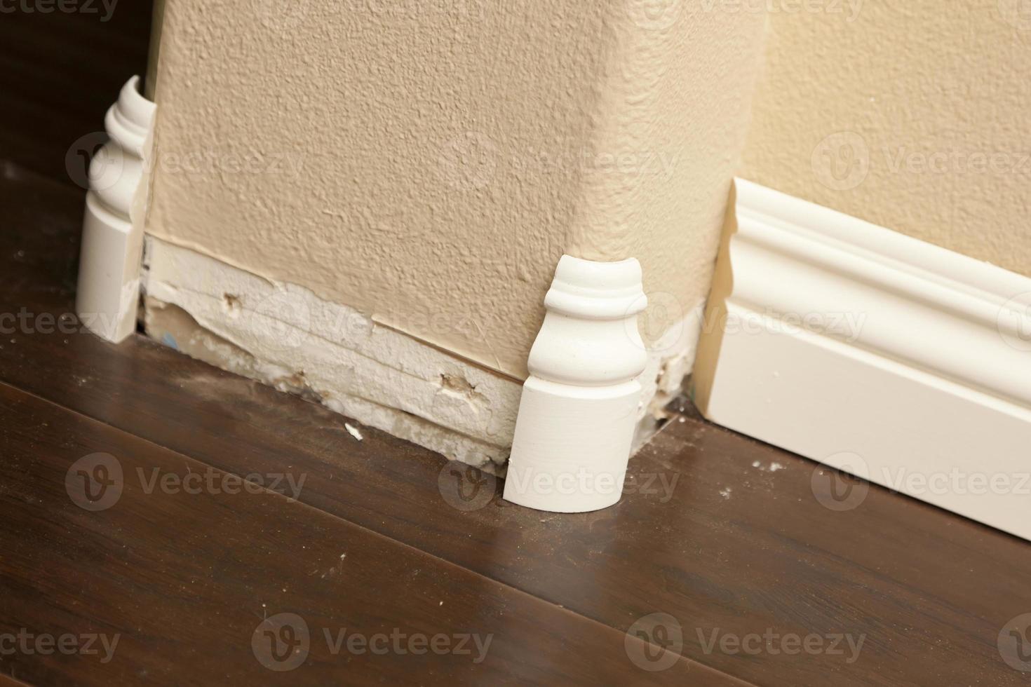 New Baseboard and Bull Nose Corners with Laminate Flooring photo
