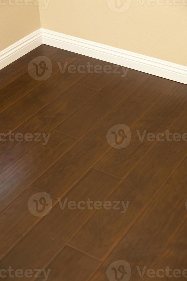 Newly Installed Brown Laminate Flooring and Baseboards in Home 16356625 Stock Photo at Vecteezy