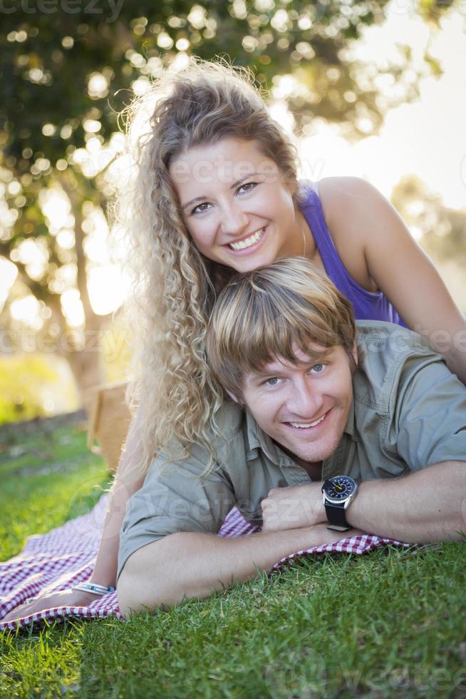 An Attractive Couple Enjoying A Day in the Park photo