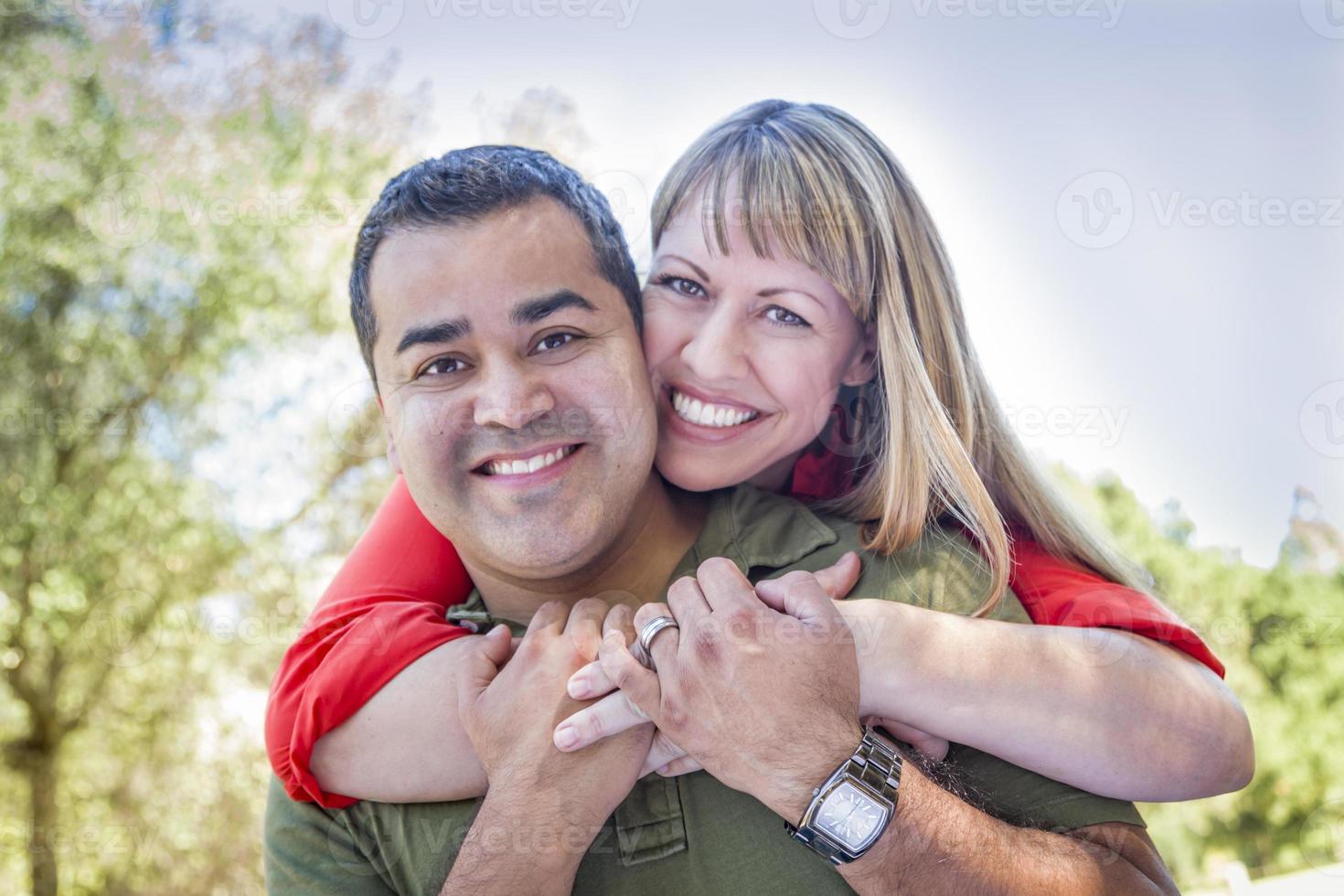 Attractive Mixed Race Couple Piggyback at the Park photo