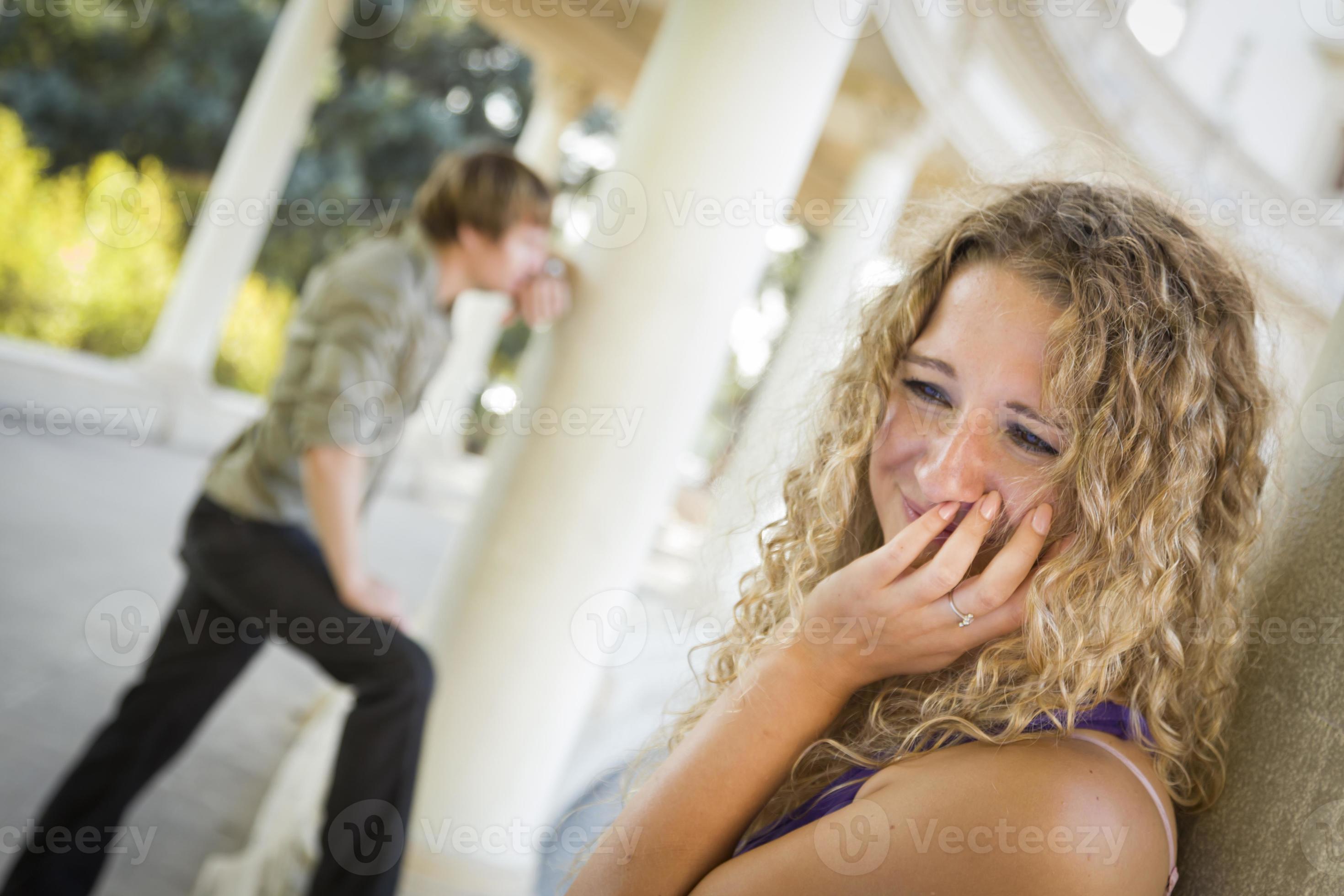 Woman Upset While Man Comtemplates in the Background 16356918 Stock Woman Upset While Man Comtemplates in the Background 16356918 Stock