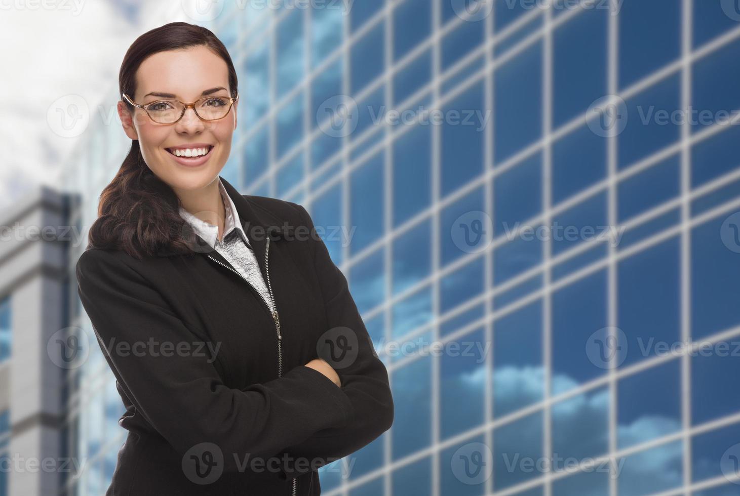 Confident Attractive Mixed Race Woman in Front of Corporate Building photo