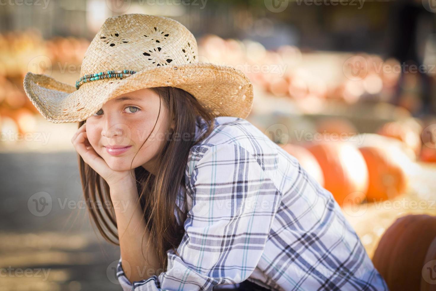 Preteen Girl Portrait at the Pumpkin Patch photo