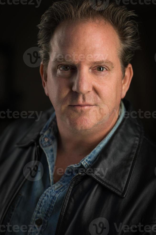 Dramatic Portrait Head Shot of Middle Aged Man photo