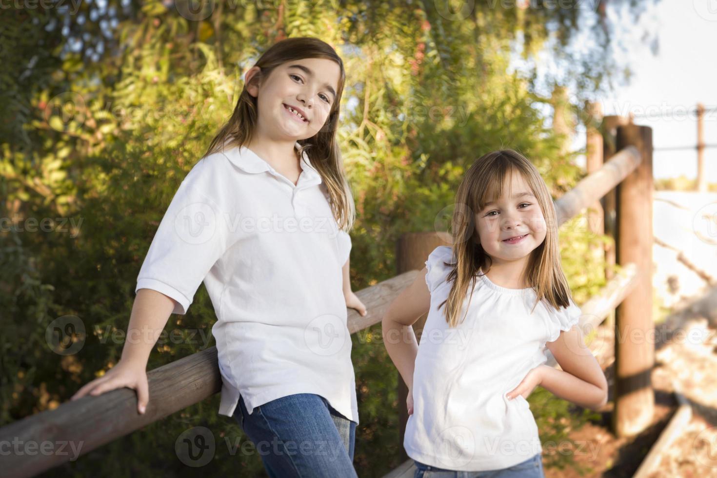 Pretty Young Sisters Portrait Outside photo