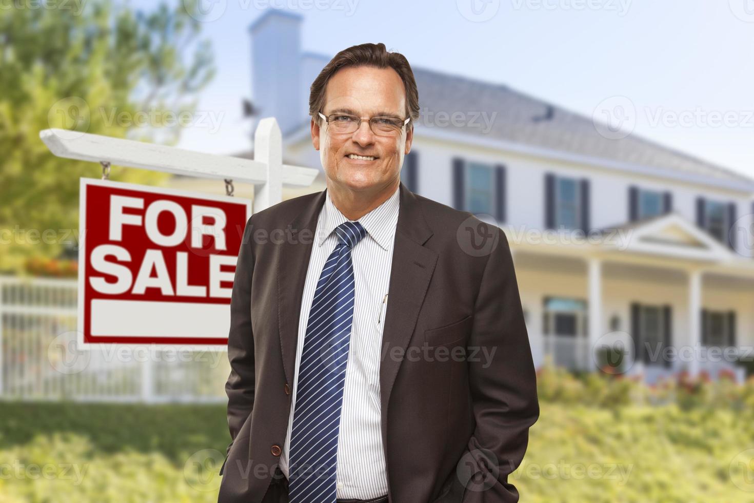 Real Estate Agent in Front of For Sale Sign, House photo