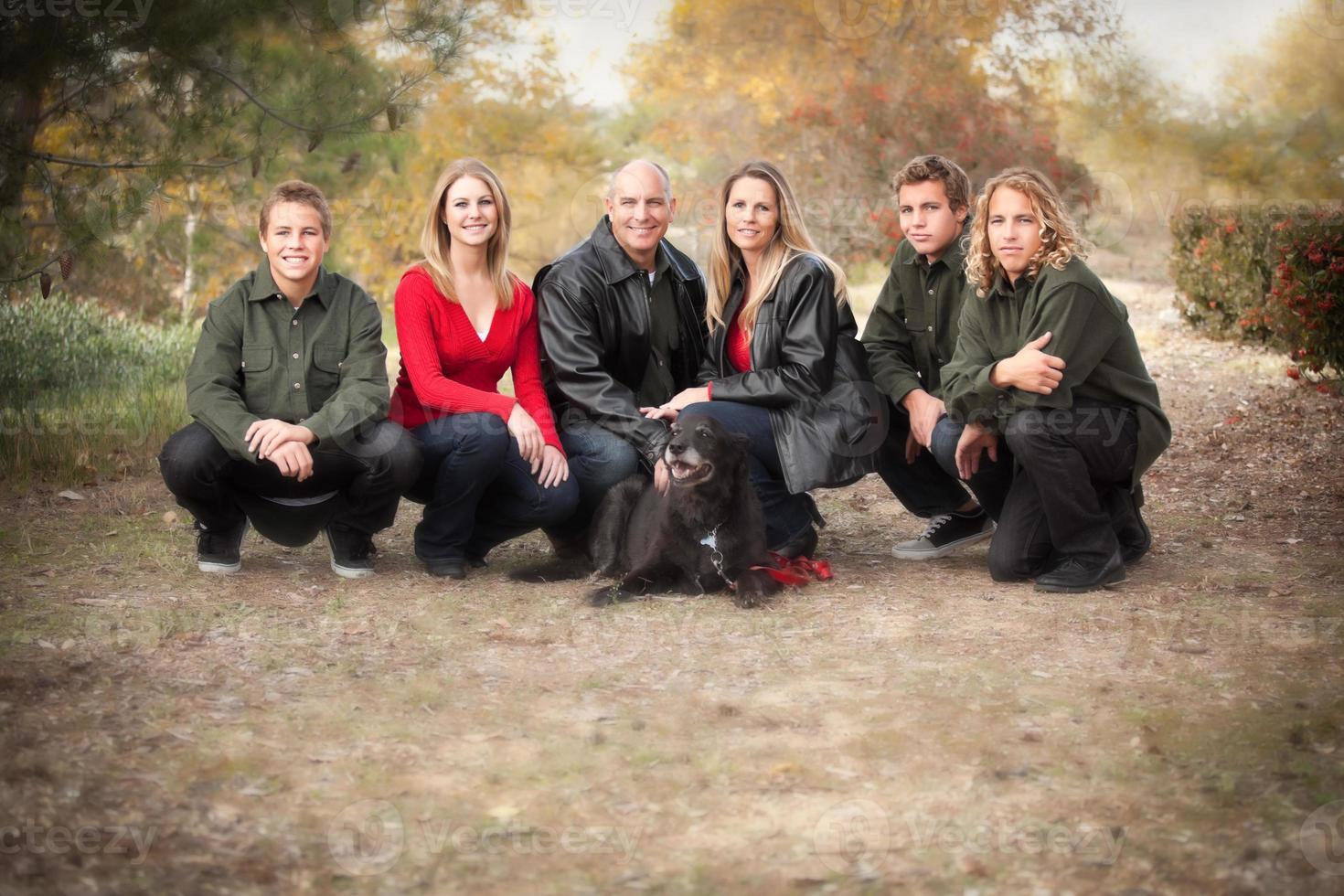 Attractive Family Pose for a Portrait Outdoors photo