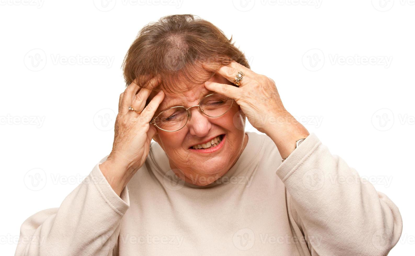 Senior Woman with Aching Head on White photo