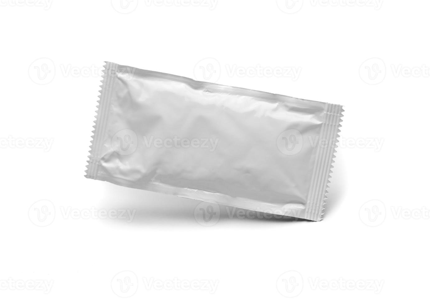 Blank White Condiment Packet Floating Isolated on White Background photo