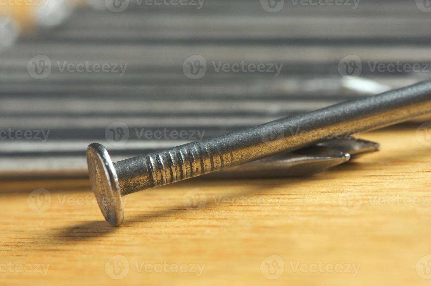 Macro of Nails on Wood photo