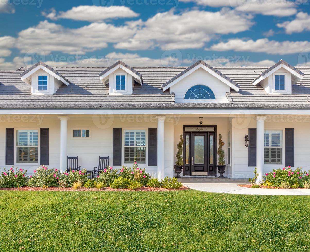 Beautiful Custom Built Home Facade and Yard. photo