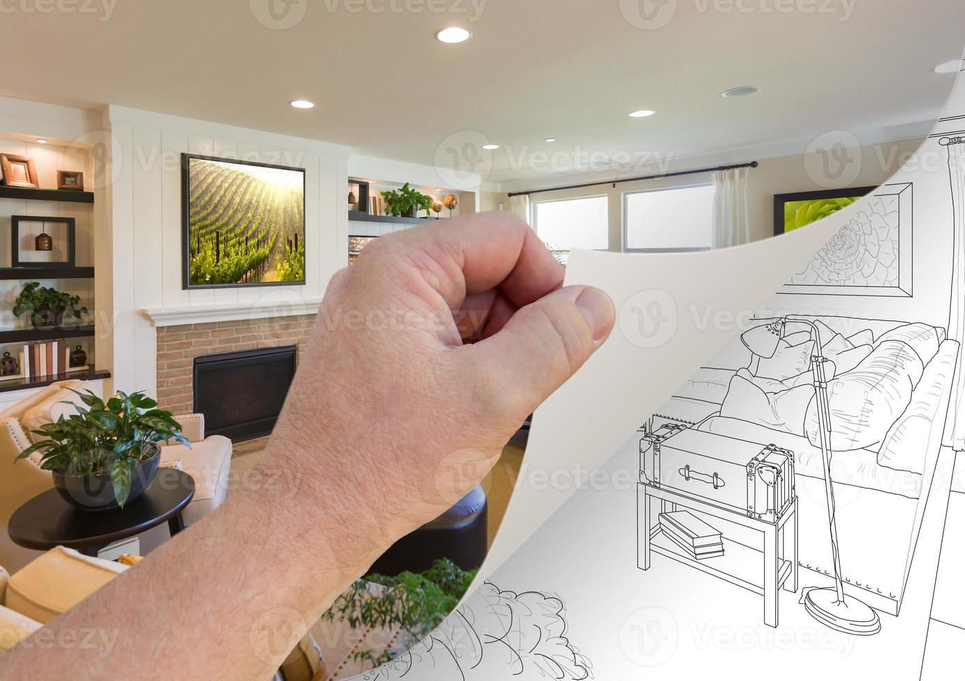 Hand Turning Page of Custom Living Room Photograph to Drawing photo