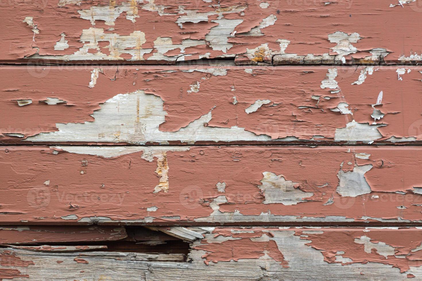 Weathered Wood Panel Wall With Peeling Paint Textured Background photo