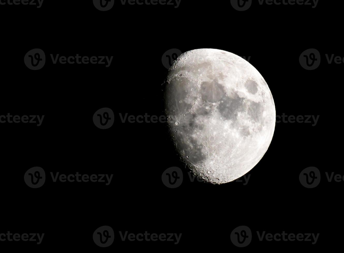 Three Quarter Full Moon Against Black Sky - 40 MP Image photo