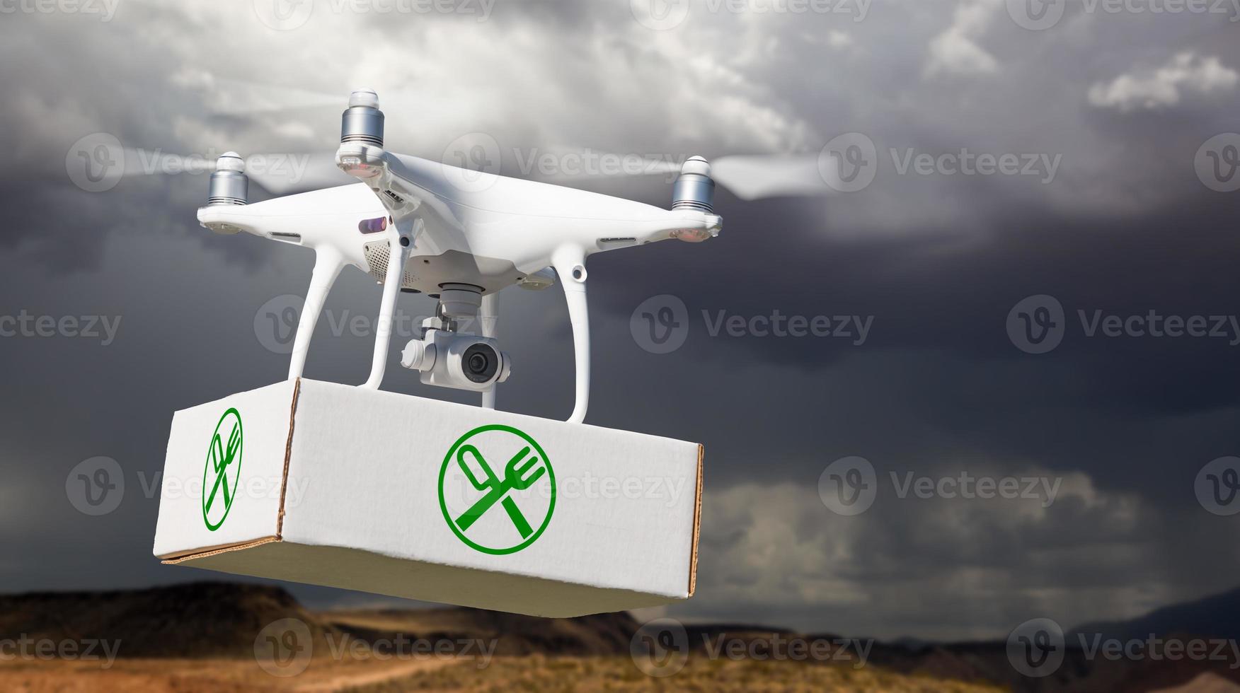 Unmanned Aircraft System UAV Quadcopter Drone Carrying Package With Food Symbol Label Near Stormy Skies. photo