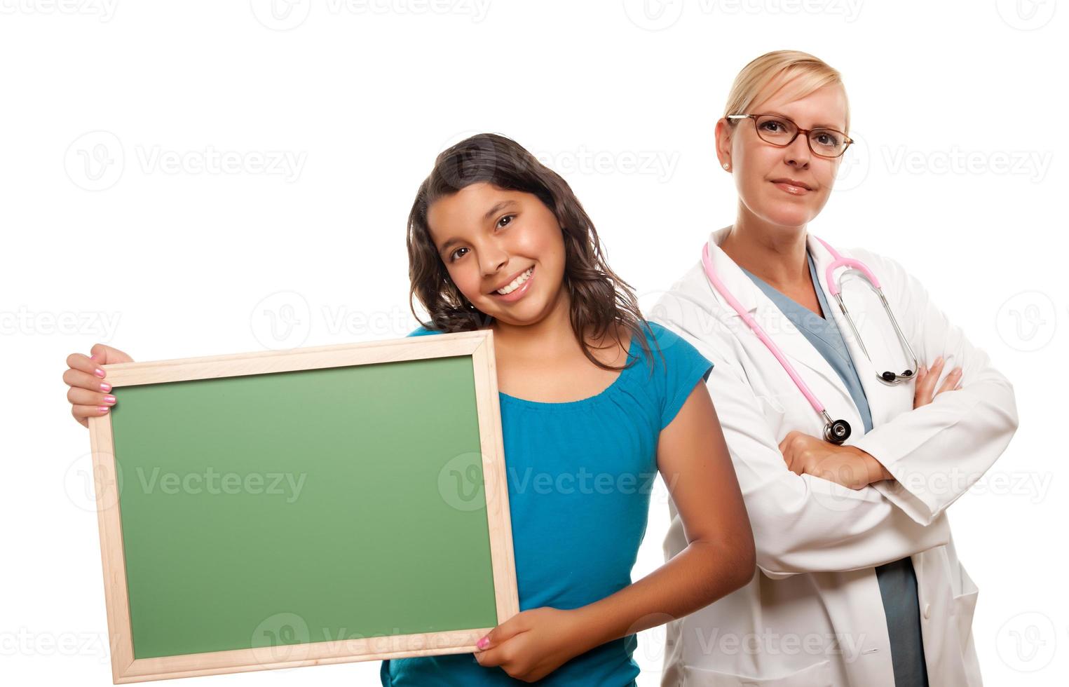 Pretty Hispanic Girl Holding Blank Chalkboard photo