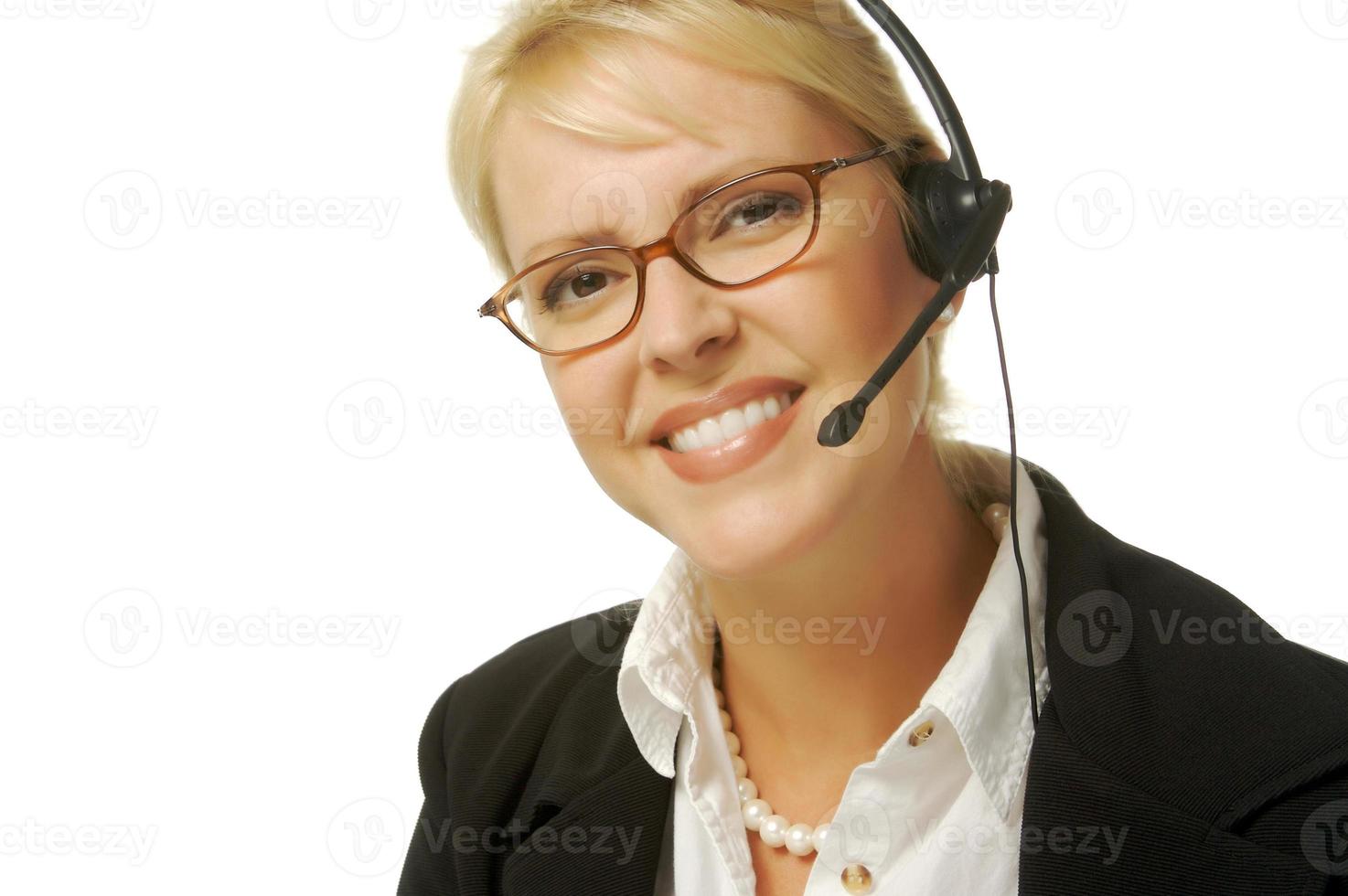 A beautiful friendly secretary telephone operator. photo