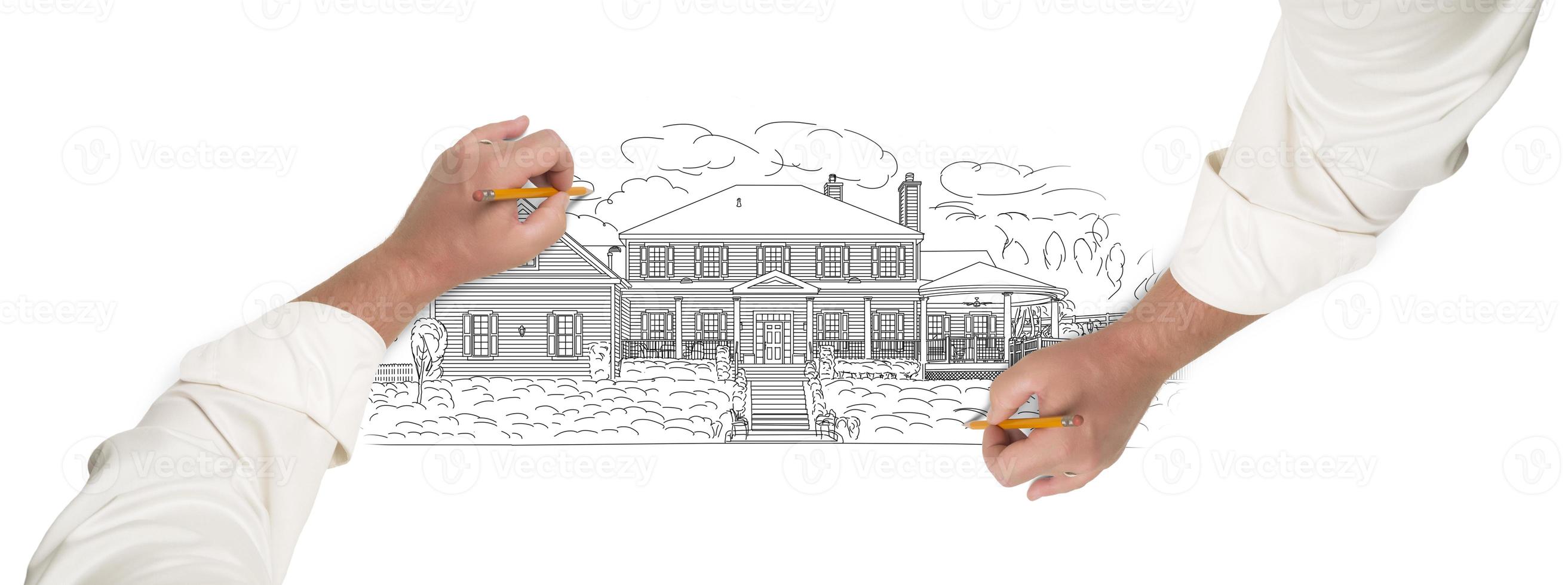 Male Hands Sketching A Beautiful House photo
